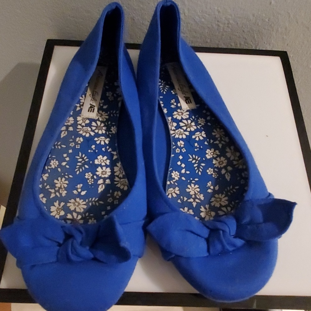 Blue flats with bow